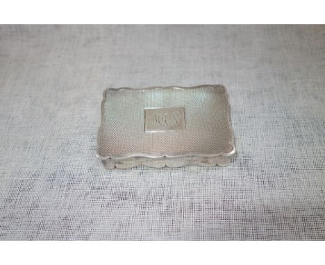 A SILVER SNUFF BOX with engine turned decoration, the lid cartouche with initials 'MAS', approximately 3.50 oz