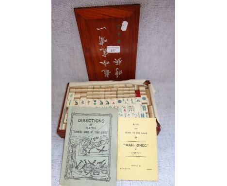 A MAHJONG SET, in a fitted wooden case