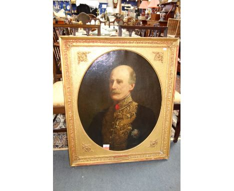 CATHERINE OULESS: Portrait of a military gentleman with gold braided coat, oil on canvas, signed and dated 1912, in a gilt fr