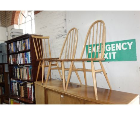 ERCOL; A PAIR OF PALE ELM AND BEECH COMB-BACK CHAIRS, and a similar pair of hoop-back chairs