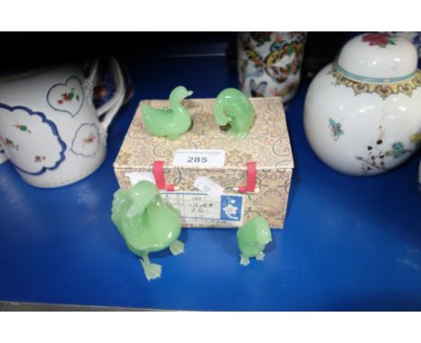 A COLLECTION OF CHINESE "JADE" GLASS BIRDS (4)