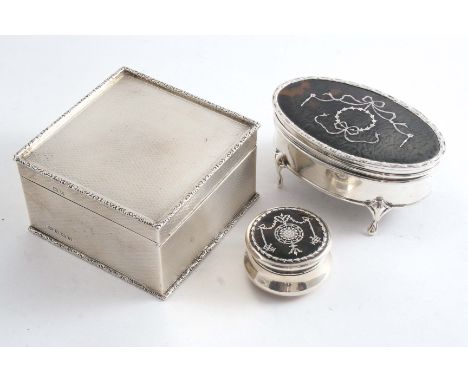 TWO SMALL DRESSING TABLE BOXES with inlaid tortoiseshell covers by two different makers, Birmingham 1911 and London 1905, and