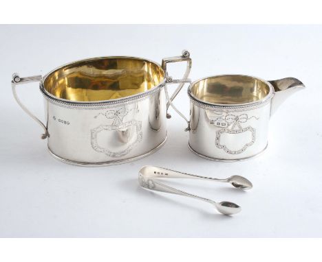 A VICTORIAN OVAL SUGAR BASIN with angular handles & a corded border by R. Martin & E.Hall, London 1882, a later cream jug of 