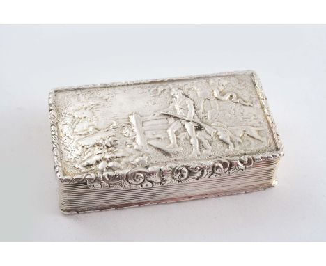 A VICTORIAN RECTANGULAR SNUFF BOX with reeded sides and an engine-turned base, the cover chased with a hunter with gun & dogs