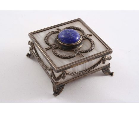 AN EDWARDIAN MOUNTED WHITE HARDSTONE BELL PUSH square with domed lapis-lazuli button and applied foliate festoons around the 