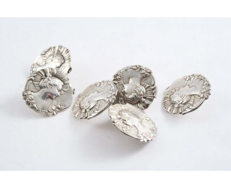 A SET OF SIX LATE VICTORIAN/EDWARDIAN ART NOUVEAU BUTTONS cast in relief with the portrait of a young girl in a hat, by C. Sa
