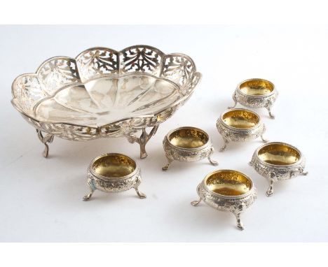 A LOBED OVAL BONBON DISH on four legs by H. Vale & Co., Chester 1911 and a set of six small Victorian circular salts with bea