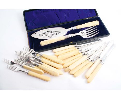 A SET OF TWELVE PAIRS OF IVORY HANDLED DESSERT KNIVES & FORKS  by William Hutton & sons Ltd., Sheffield 1913 and a cased pair