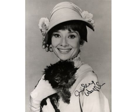 HEPBURN AUDREY: (1929-1993) Belgian-born British Actress, Academy Award winner. Signed 8 x 10 photograph, a charming image of