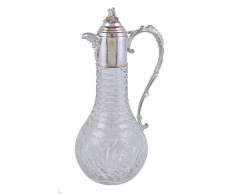 A silver mounted cut glass claret jug by A. J. Poole, Birmingham 1998, with a grape vine finial to the ogee domed cover and a