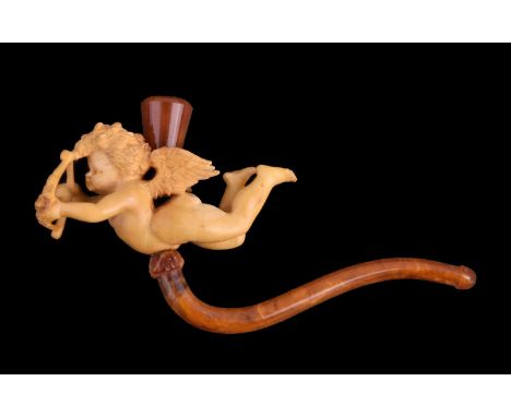 A meerschaum cheroot pipe, carved with a flying Cupid holding his bow and arrow, with an amber holder and mouthpiece, 11.5cm 