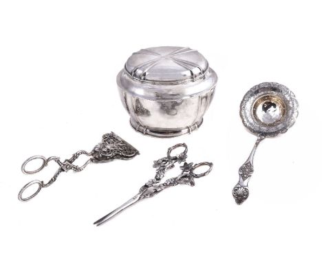 A Czechoslovakian silver shaped oval tea caddy, 1922-29 3rd standard (.800); a German  vine pattern grape scissors, post 1872