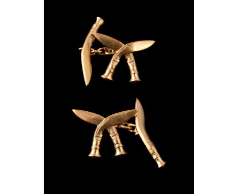 A pair of gold coloured Gurkha Regimental double sided cufflinks, designed as crossed khukuri and a single khukuri with belch