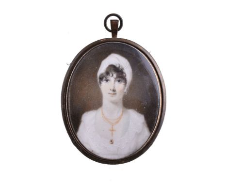 ϒ English School (circa 1820) Portrait of a lady dressed in white with a white cap and gold cross on chain Watercolour on ivo