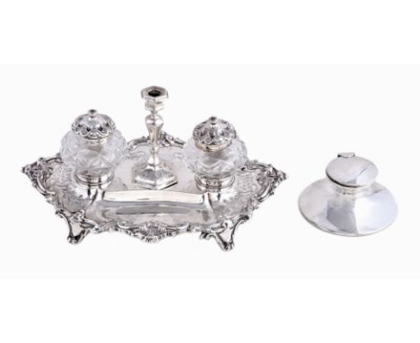 A Victorian silver shaped navette inkstand by Henry Wilkinson & Co., Sheffield 1865, with a central detachable taperstick fla