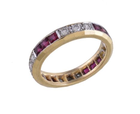 An 18 carat gold ruby and diamond eternity ring, set with alternating square cut rubies and brilliant cut diamonds, approxima