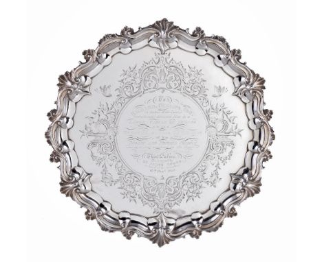 A Victorian silver shaped circular salver by the Barnard Brothers, London 1852, with shell and rocaille work to the raised sc