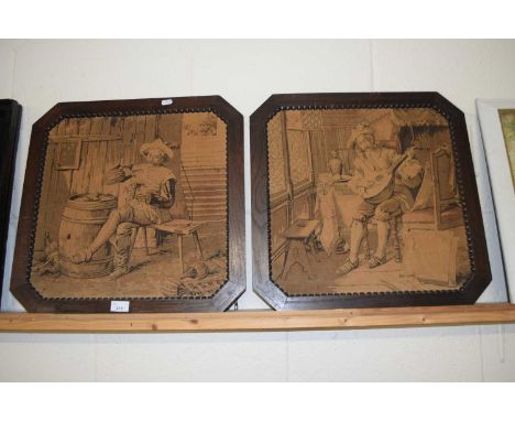 Pair of monochrome tapestry pictures, a musician and a drinker set in dark oak frames