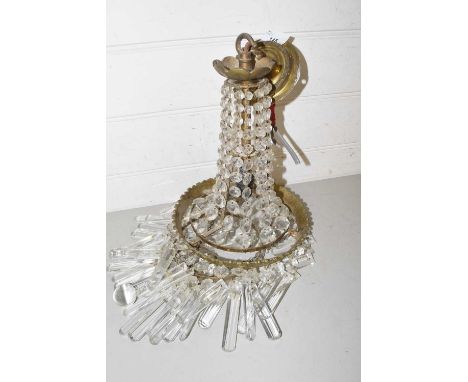 Three tier centre ceiling light fitting with glass prismatic drapes