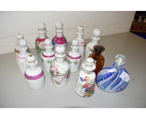 Collection of various ceramic and glass scent bottles