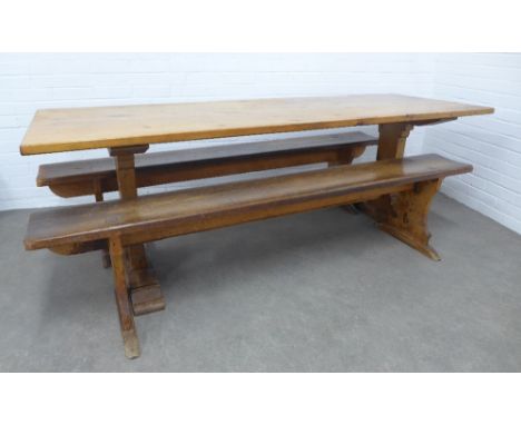Pine tencher style table and a pair of vintage pine benches, 213 x 72 x 74cm. (3)