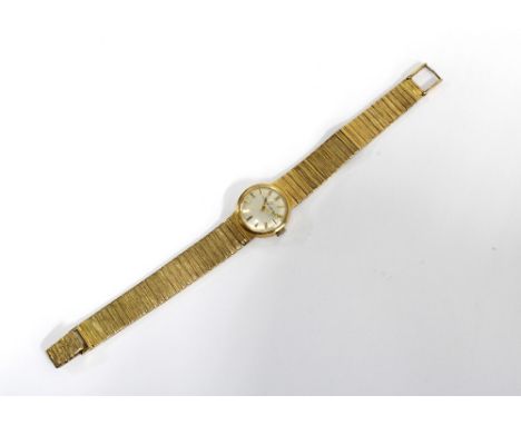Ladies vintage 9ct gold Eterna wristwatch on a 9ct gold textured bracelet strap, with original box
