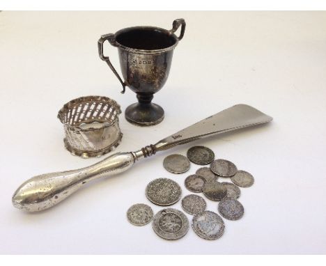 A miniature silver tankard together with a serviette ring shoe horn and a small quantity of silver coins.