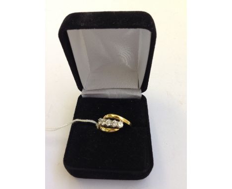 An 18 carat gold five diamond set dress ring (1 carat approx.) of very good quality (VS).