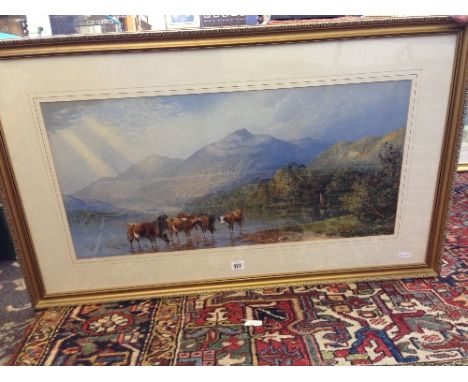 A gilt framed and glazed colour print after C Pearson and F Wainwright; Cattle by lakes edge with mountains in distance.