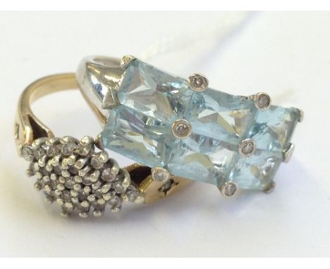 A 9 carat gold ladies' dress ring together with another.
