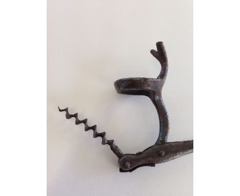 A 19th century French Delavigne type single lever corkscrew with single loop handle, unmarked, (worm slightly bent).