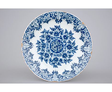 A fine blue and white Dutch Delftware plate, ca. 1700 -  Dia.: 22 cm Marked AK for Adrianus Kocx, ""De Grieksche A"" workshop