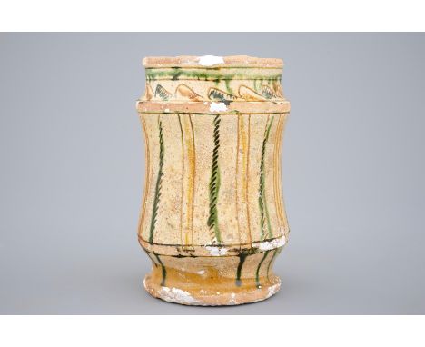 A late Byzantine earthenware sgraffiato albarello, Cyprus, 13/14th C. -  H: 15,5 cm, dia.: 10 cm. A related goblet is in the 