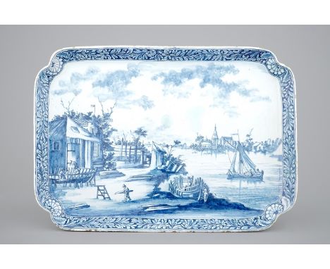 A blue and white Dutch Delft tray depicting a shipyard, dated 1783 -  Dim.: 39 x 27 cm Dated 1783 in the flag on top of the b