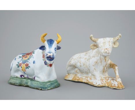 Two Dutch Delftware models of cows, 18/19th C. -  Dim.: ca. 15,5 x 10,5   cm - Condition reports and high resolution pictures