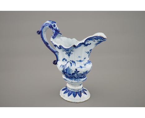 A Dutch Delftware helmet-shaped ewer, ca. 1760 -  H.: 27 cm Marked ITD below an A, for Jan Theunis Dextra, ""De Grieksche A""
