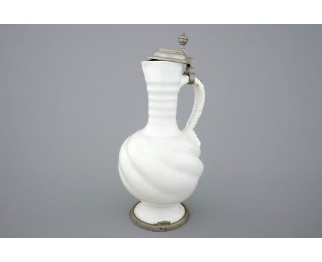 A large white Delft pewter-mounted jug with rope twist handle, 17th C. -  H.: 34,5 cm The pewter cover would benefit from a s
