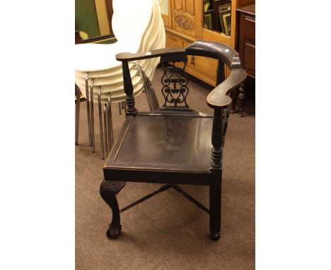 Late 19th Century ebonised Chippendale style corner elbow chairs.