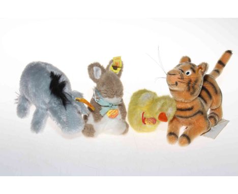 Four Steiff teddy bear toys; Eeyore, Tigger, Manni and Piccy (4).