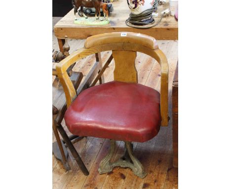 Vintage cast base revolving chair.