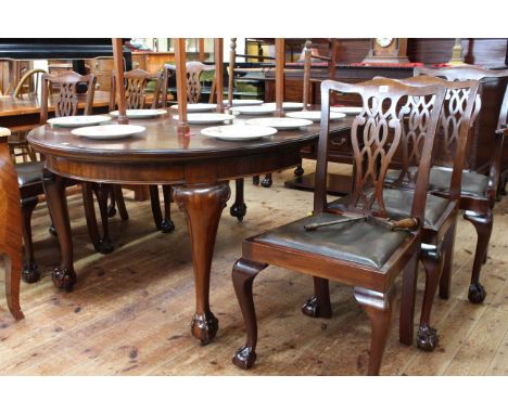 Early 19th Century mahogany Chippendale style eight piece dining suite comprising two door sideboard with three central drawe
