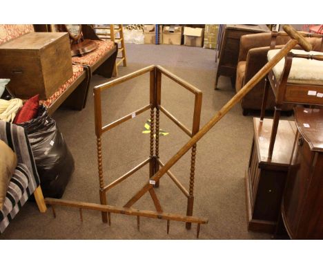 Vintage hay rake and folding towel rail.