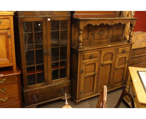 Oak two door bookcase, oak buffet sideboard, set of four mahogany Chippendale style dining chairs and child's chair.