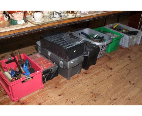 Seven boxes of various tools.