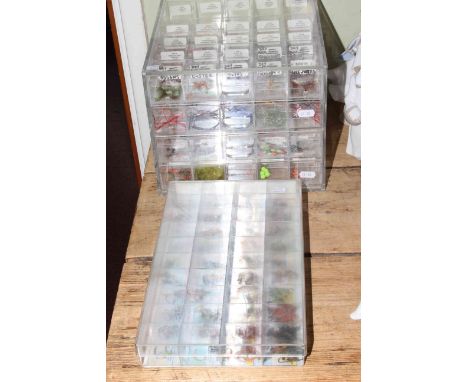 Two fly fishing display cabinets and flies, approximately 1,200