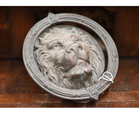 A large vintage brass lion-mask and ring door-knocker, 21 cm diam overall to/w a pair of metal wall sconces