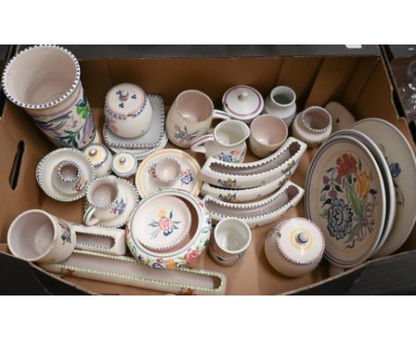 A large collection of Poole pottery with floral-painted decoration and printed marks and approximately twenty-five pieces of 