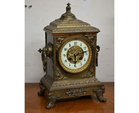 A 19th century French brass mantel clock with Japy Freres drum movement striking on a bell, 35 cm 