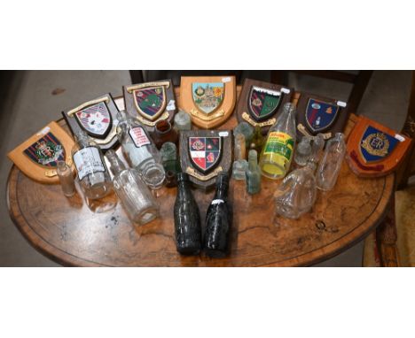 Various vintage and later glass bottles to/w eight modern Regimental shields (box) 