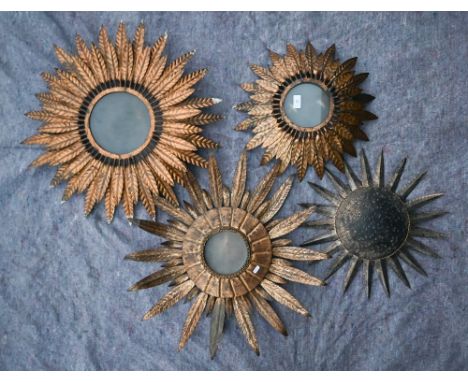 Four various vintage gilt metal wall sconces with sunburst and fronded surrounds (4) 